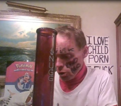 Picture of Jason Bishop with I Love Child Porn sign Picture of Jason Bishop with I Love Child Porn sign