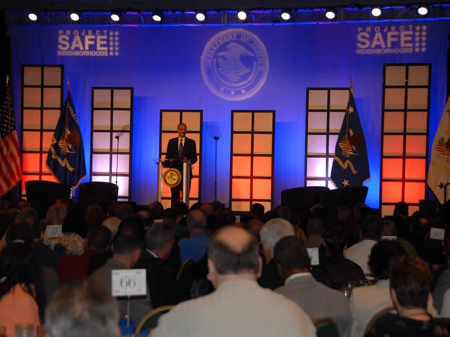Attorney General Holder addresses conference attendees of the Project Safe Neighborhood annual conference held in New Orleans.