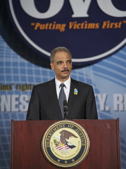 Attorney General Holder addressing the audience at the Candlelight Ceremony.