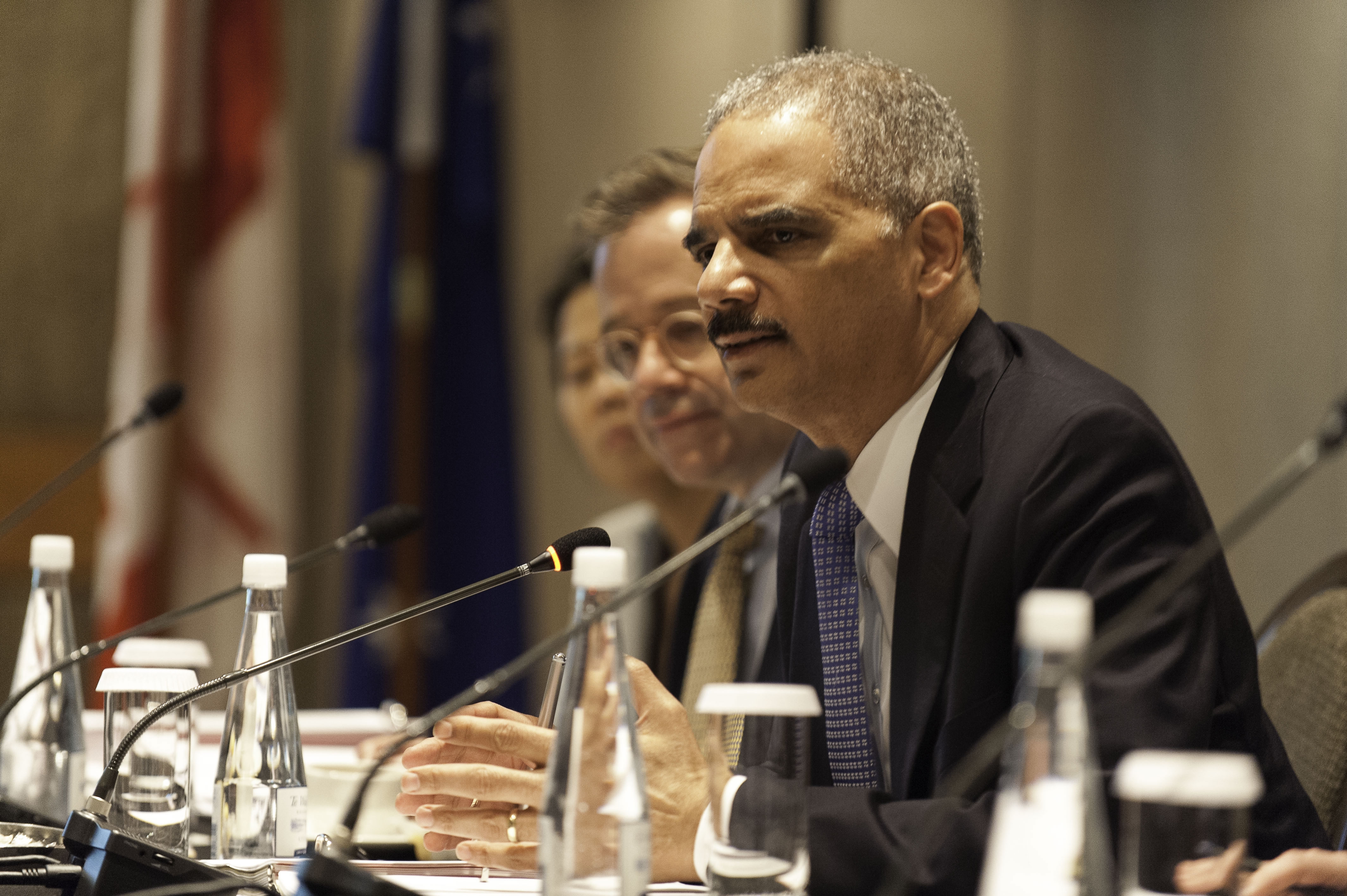 Attorney General Holder speaks during a meeting of Attorneys General