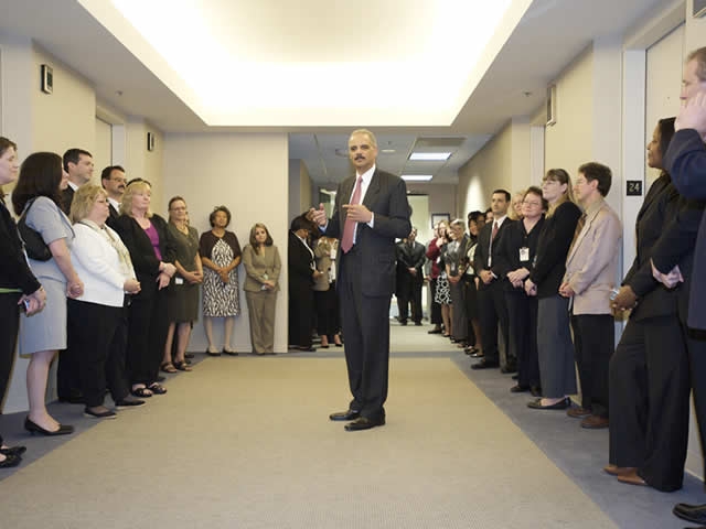 The Attorney General chats with EOIR employees.