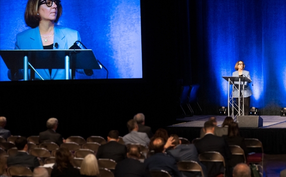 Deputy Attorney General Lisa O Monaco delivers remarks from a podium at the American Bar Association National Institute on White Collar Crime in Miami, Florida.