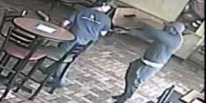 A screenshot of a video showing the attempted robbery of a restaurant in Maplewood.