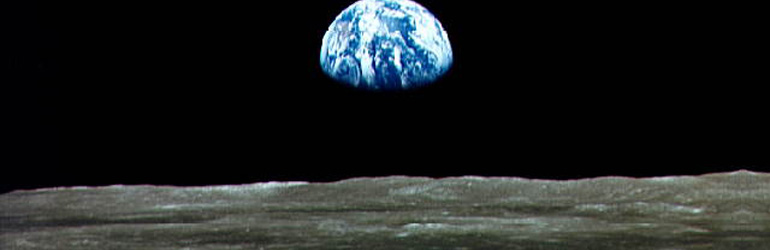 On July 20, 1969, after a four day trip, the Apollo astronauts arrived at the Moon. This photo of Earthrise over the lunar horizon was taken from the orbiting Command Module. Courtesy of NASA.