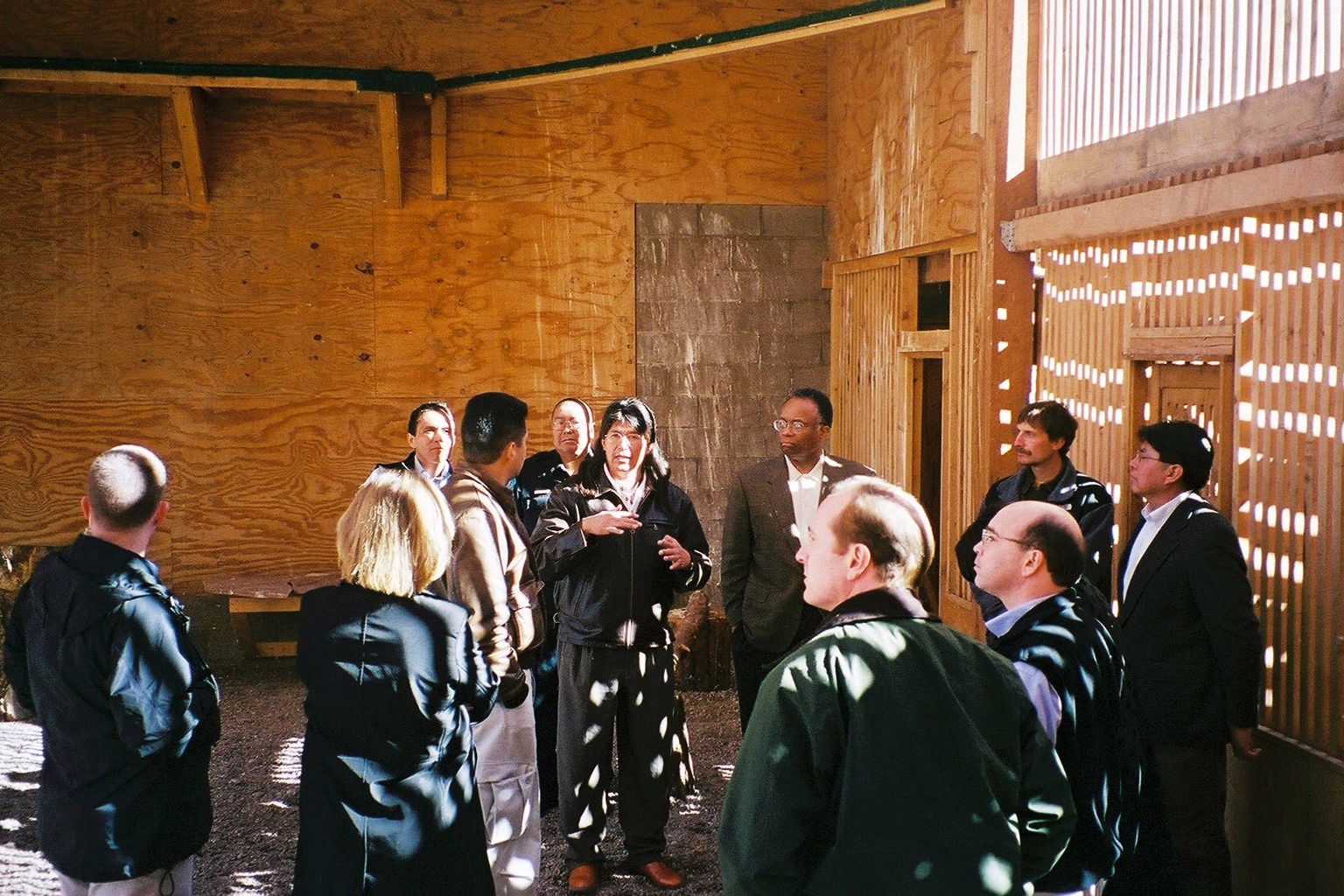 Governor Bowekaty of the Pueblo of Zuni explains the Pueblo of Zuni Eagle Aviary to Deputy AG Larry D. Thompson and other federal visitors