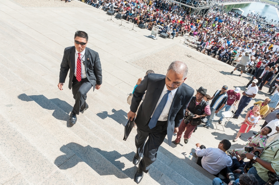 Attorney General Holder walks up the stairs of the Lincoln Memorial Attorney General Holder walks up the stairs of the Lincoln Memorial