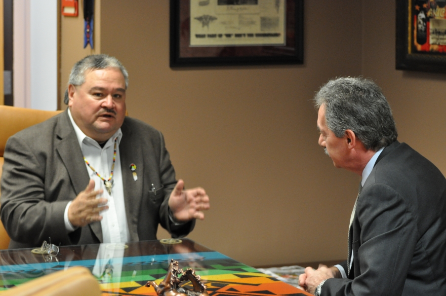 Deputy Attorney General Cole listens as Standing Rock Sioux Tribe Vice-Chairman Mike Faith talks about the concerns of the Standing Rock community. Deputy Attorney General Cole and Standing Rock Sioux Tribe Vice-Chairman Mike Faith.