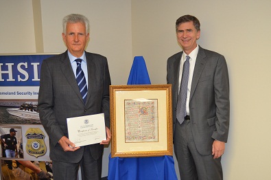 Consul General and U.S. Attorney with the recovered Italian manuscript