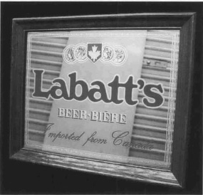 Exhibit B: 'Labatt's Beer-Biere Imported from Canada' shown in a picture frame.