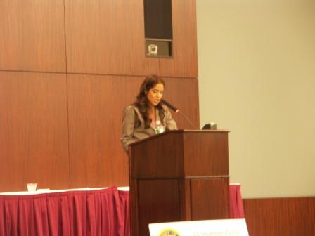 Photograph of Russlyn Ali speaking at Title VI Conf.