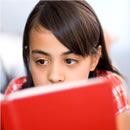 photograph of a girl reading a book