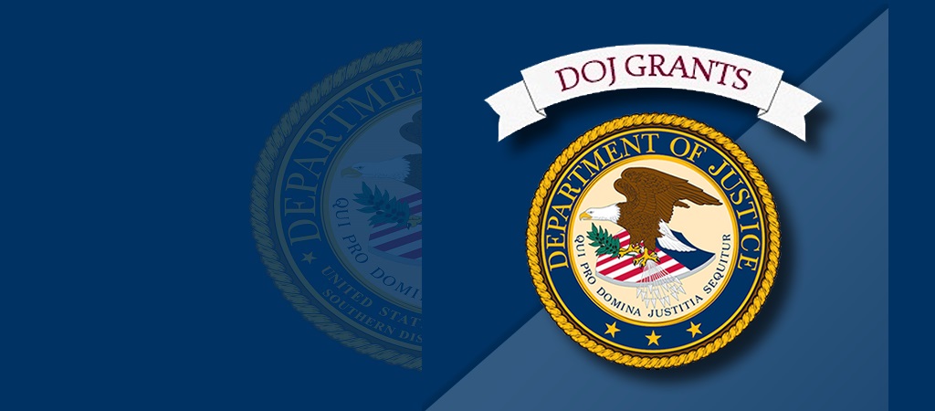 Graphic depicting the DOJ seal below a white ribbon that reads “DOJ Grants,” all on a contrasting blue background.
