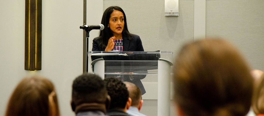 Associate Attorney General Vanita Gupta speaking at a podium