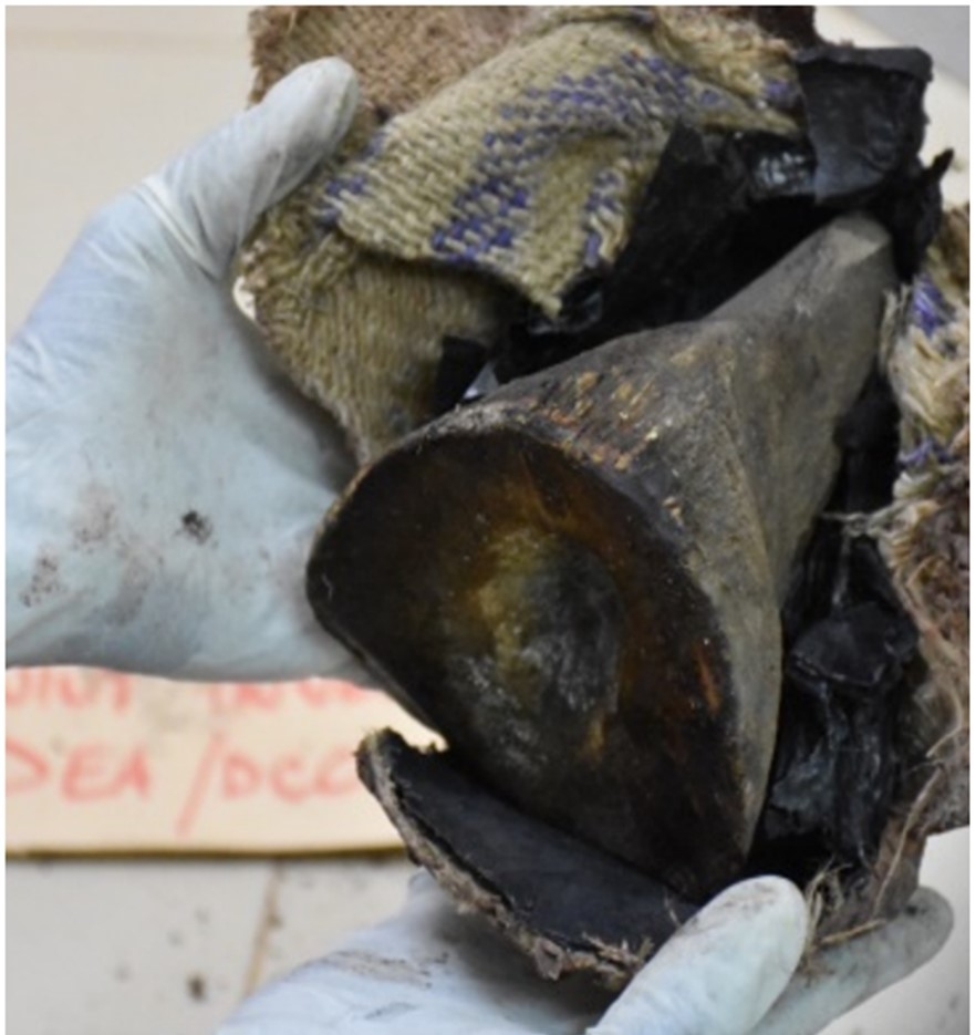 Photo of a black rhinoceros horn sold by the defendants