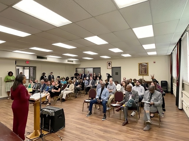 Assistant Attorney General Clarke at community meeting in Columbia.