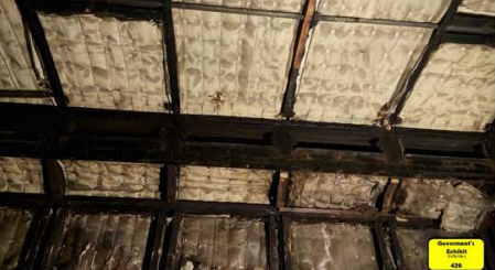 Asbestos insulation in railcar ceiling and walls