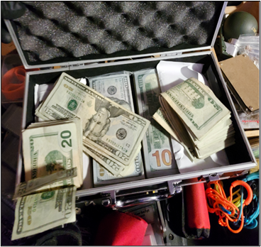 Case full of seized cash.