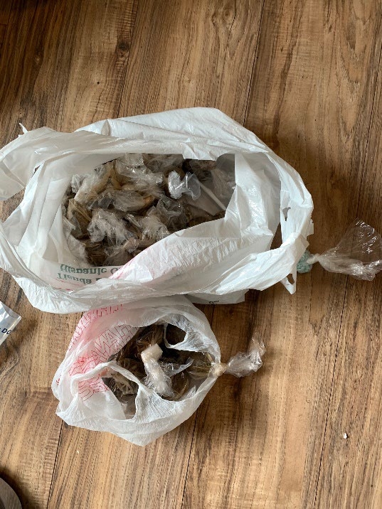 Plastic shopping bags filled with seized heroin.