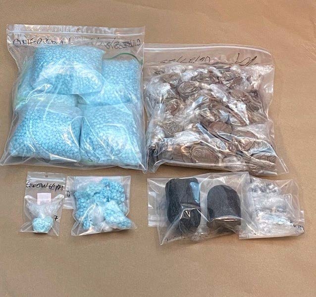 Depiction of all seized drugs stored in various style bags.