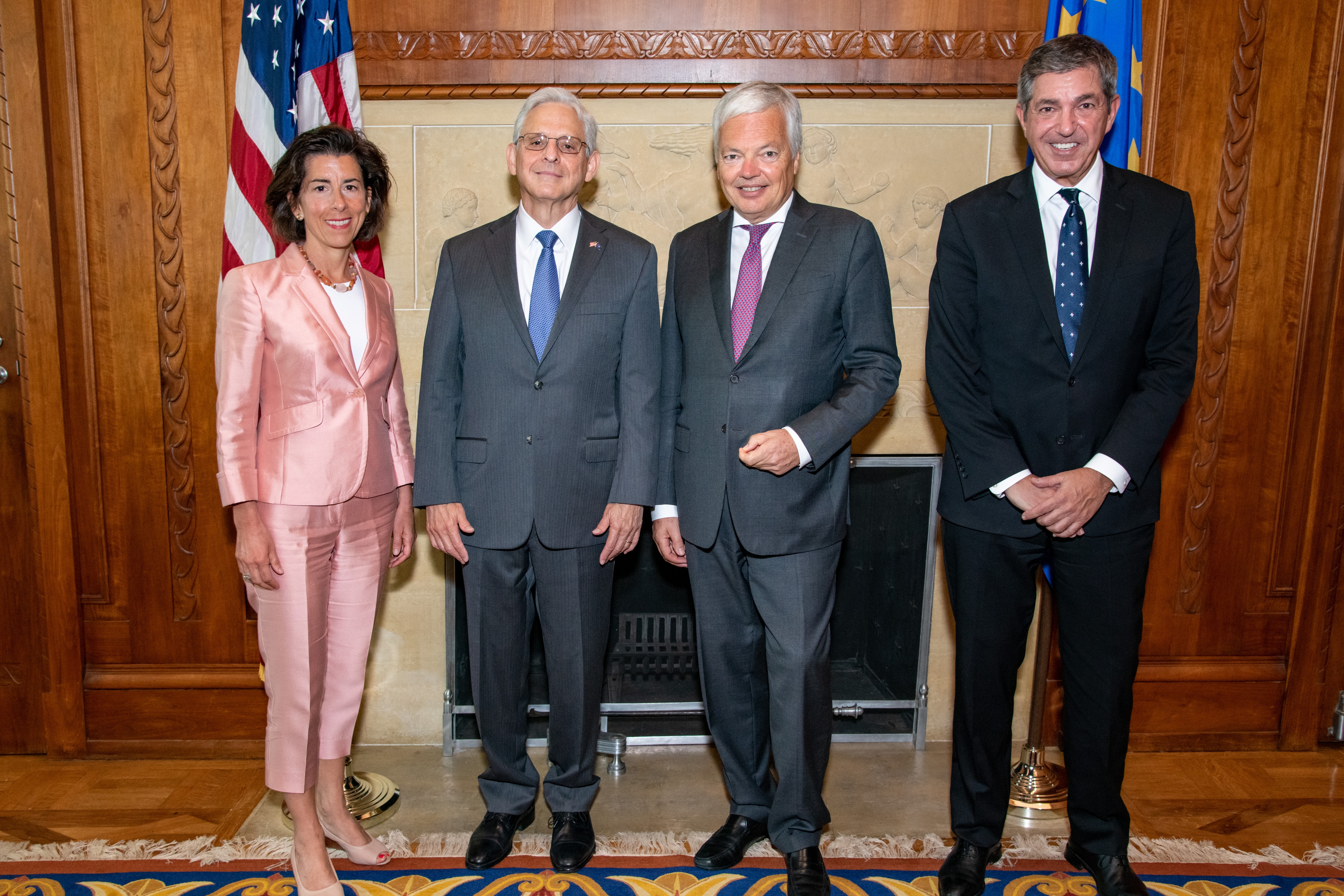 Secretary of Commerce Gina Raimondo (left), Attorney General Merrick B. Garland (left center), European Commissioner for Justice Didier Reynders (right center), and Ambassador of the EU to the United States Stavros Lambrinidis (right)