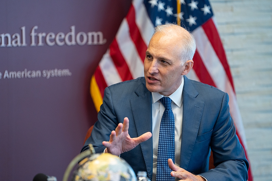 Assistant Attorney General Matthew G. Olsen speaks while seated during a Q&amp;A at the Hoover Institution in Washington, D.C.