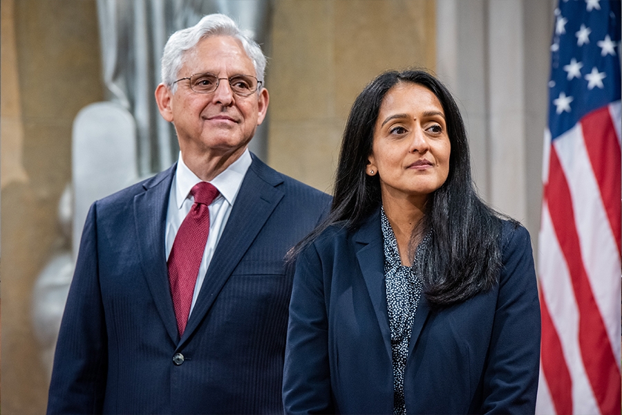 Attorney General Merrick B. Garland and Associate Attorney General Vanita Gupta look upon the award receivers.