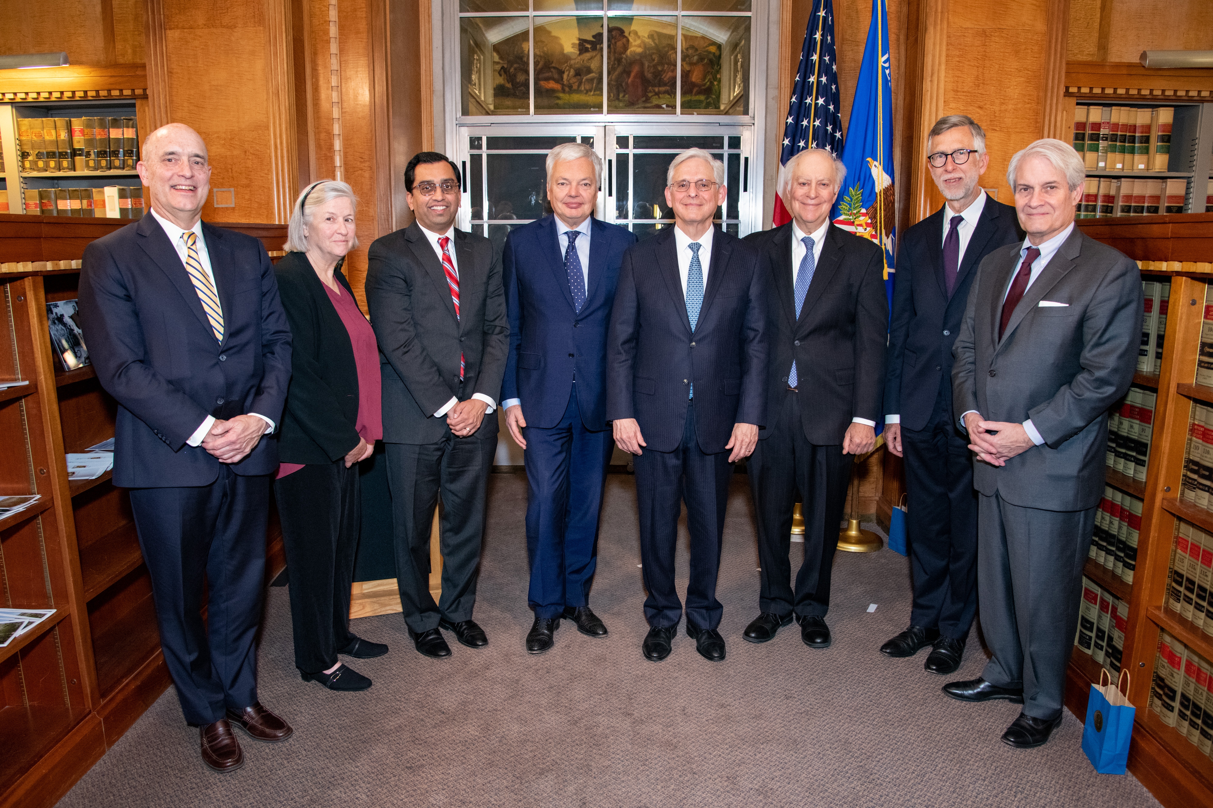 Attorney General Garland and European Commissioner for Justice Didier Reynders (center) stand with six of the eight Judges of the Data Protection Review Court (L to R) James E. Baker, Virginia A. Seitz, Rajesh De, David F. Levi, James X. Dempsey and Thomas B. Griffith.