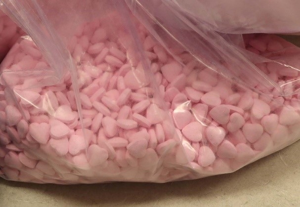 Seized pink heart shaped fentanyl-laced pills pressed to look like candy.