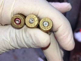 Photo of several recovered shell casings