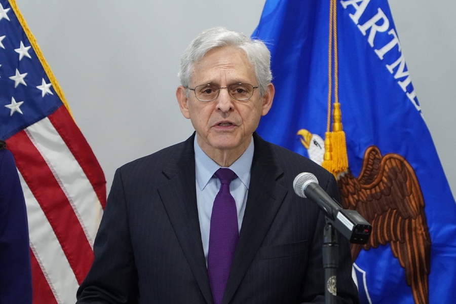 Attorney General Merrick B. Garland delivers remarks from a podium at the U.S. Attorney's Office for the Middle District of Florida