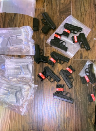 Photo of firearms as they were packaged by members of CDH to be smuggled into Mexico