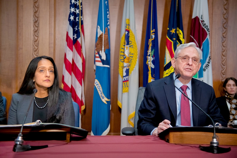 Attorney General Merrick B. Garland delivers remarks at a Reproductive Rights Task Force meeting. To the left is Associate Attorney General Vanita Gupta.