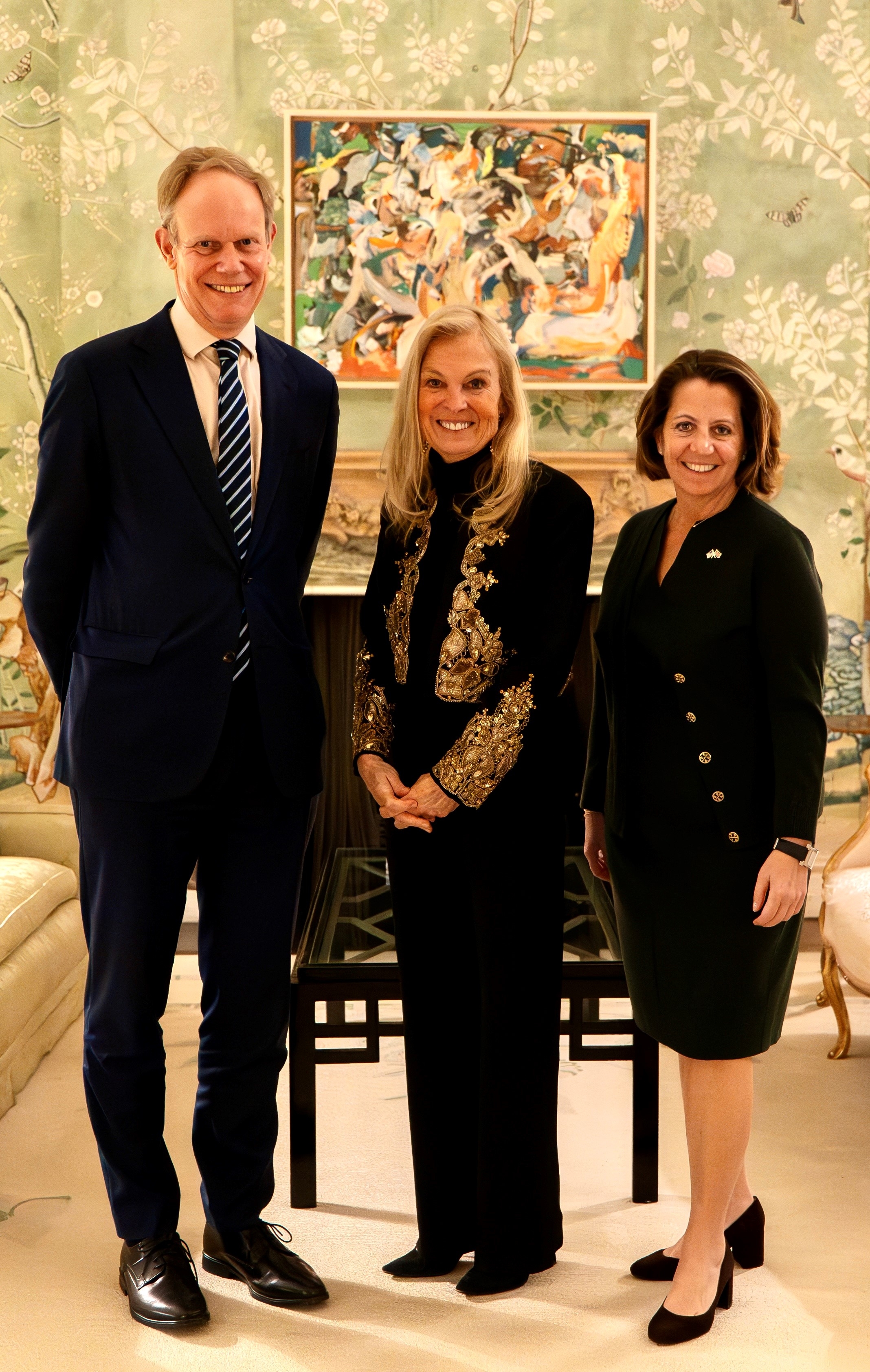Deputy Attorney General Monaco (right), U.S. Ambassador to the U.K. Jane Hartley (center), and Permanent Secretary Matthew Rycroft (left).