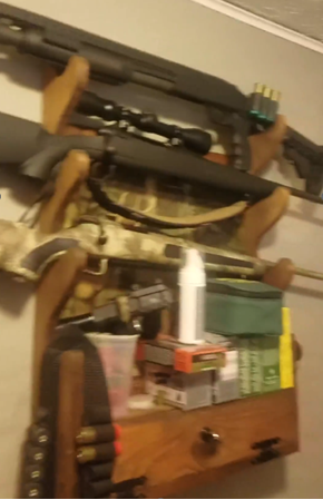 Photo from the defendant’s email account showing firearms owned by the defendant