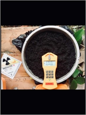 Photo sent by the defendant depicting rock substances with Geiger counters measuring radiation