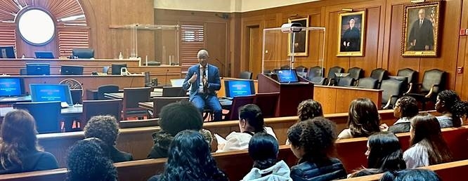 U.S. Attorney Damian Williams speaking to high school students in White Plains federal court