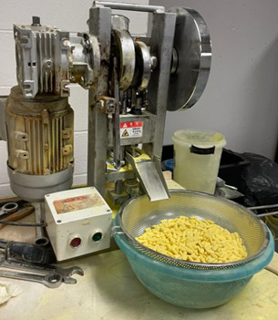 Photo of the suspected narcotics and pill presses recovered from the Gerard Avenue Building