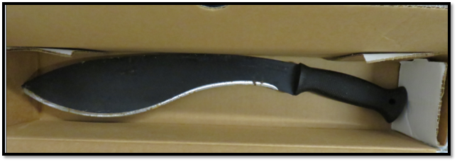 A picture containing a large machete with a curved blade.