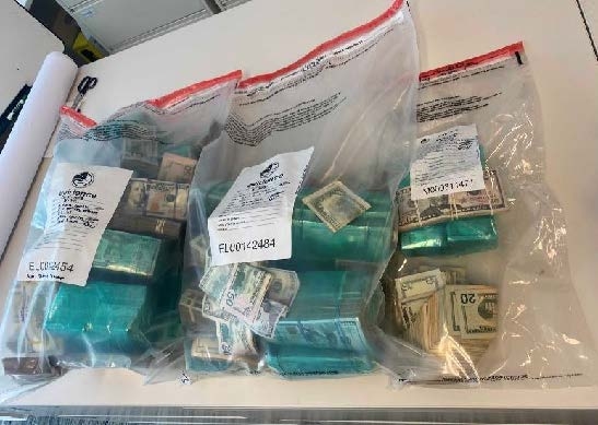 Bags of seized cash totaling more than 1 million