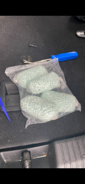 Blue pills in clear packaging