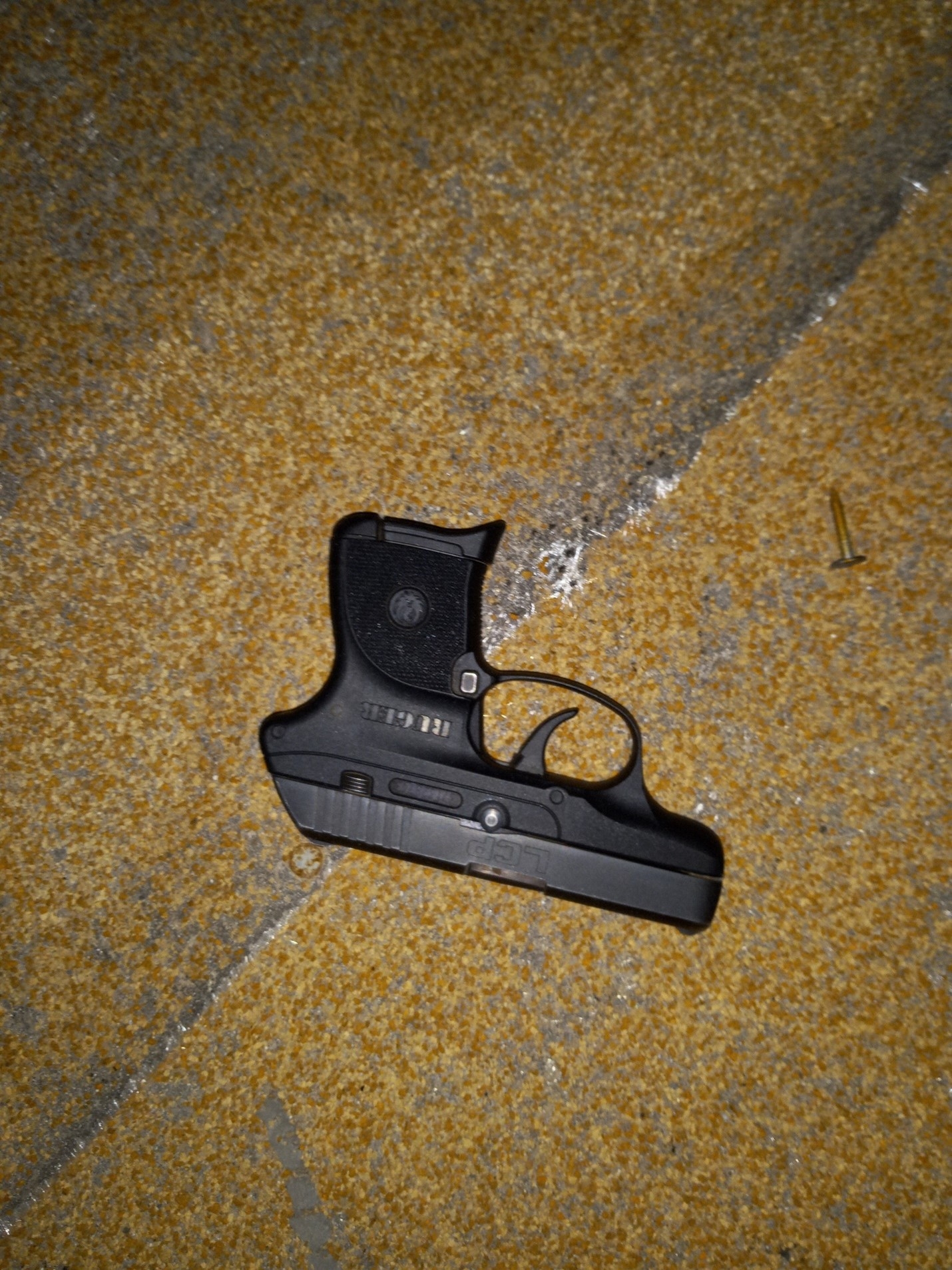 Photo of firearm that was located on the roof