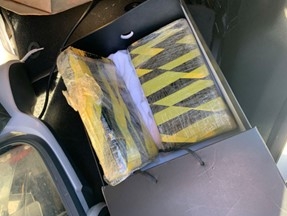 Image of seized cocaine packaged inside a box.