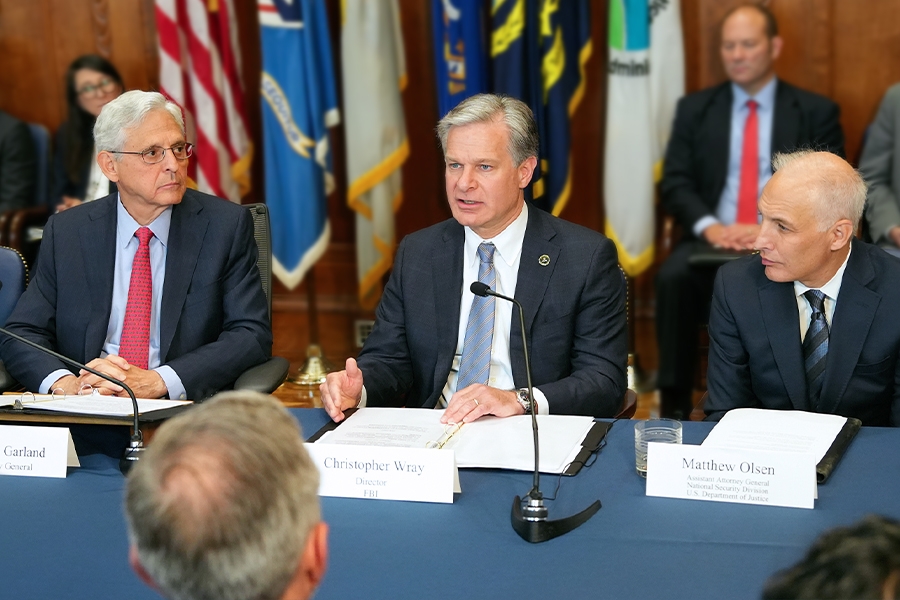 FBI Director Christopher Wray delivers remarks at the Department of Justice. He is joined by Department of Justice and federal government officials.