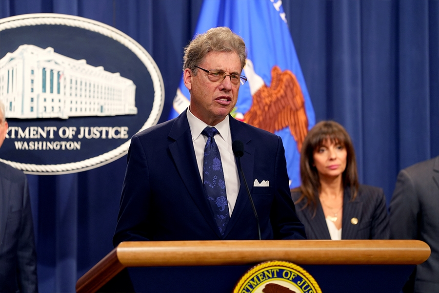 U.S. Attorney Philip R. Sellinger for the District of New Jersey delivers remarks at the Department of Justice. He is joined by Department of Justice and federal government officials.