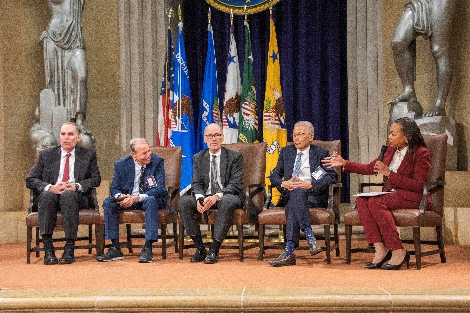 Mr. Pottinger, second from left, discussing the history of the Civil Rights Division with Eric Dreiband, Tom Perez, Bill Lann Lee, and Kristen Clarke.