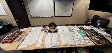table showing drugs and guns 
