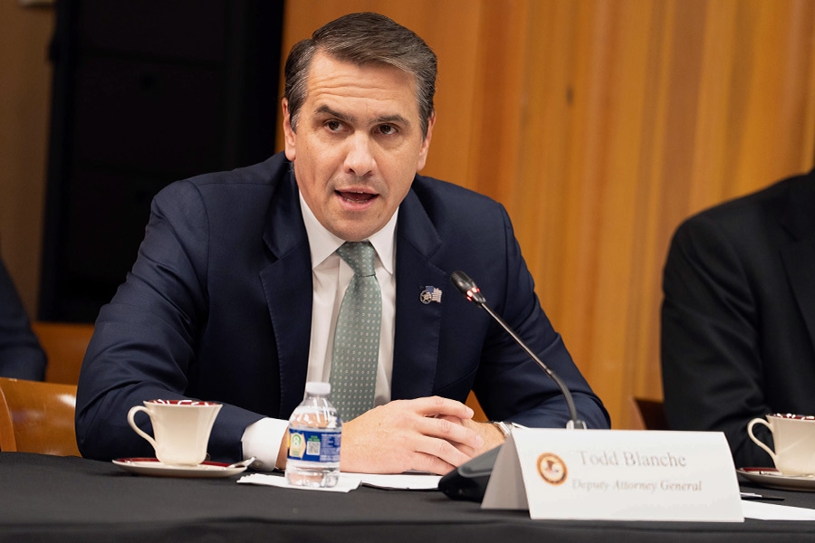 Deputy Attorney General Todd Blanche delivers remarks at the Department of Justice. He is joined by Department of Justice and federal government officials.