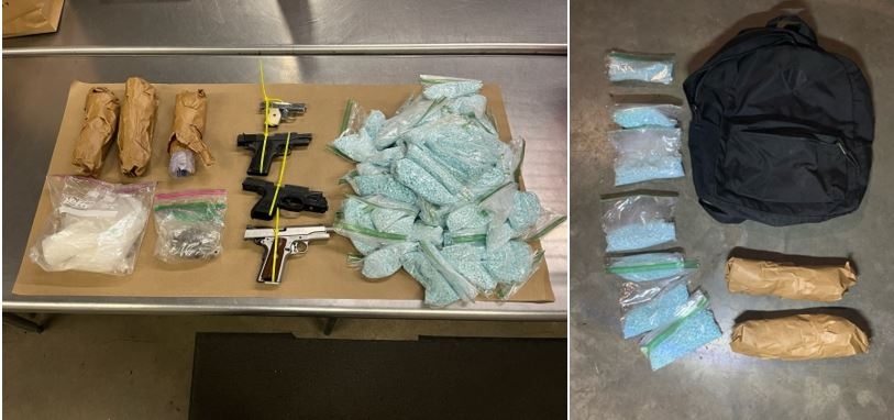 Picture of drugs and guns on a table 