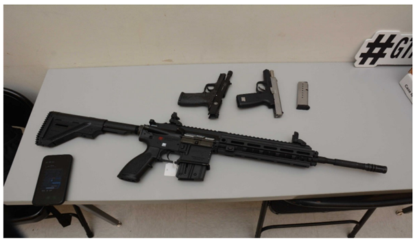 Additional firearms recovered from the abandoned getaway vehicle.