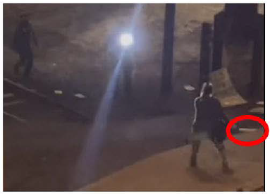 Winters shown holding knife before officers